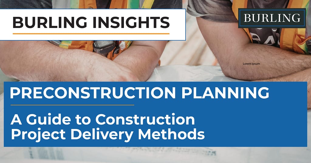 Construction team reviewing project plans to determine the appropriate delivery method.