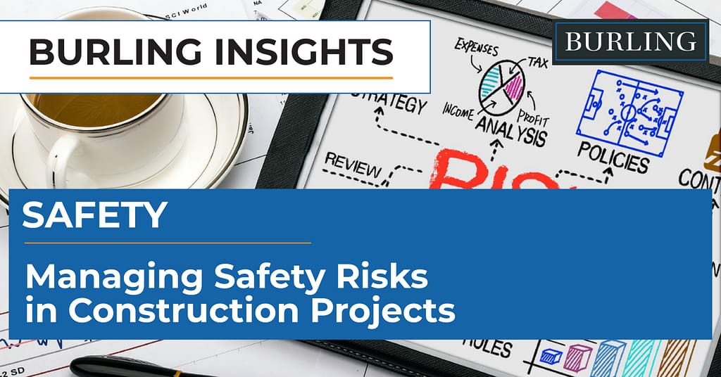 Construction workers wearing safety vests and hard hats on a job site demonstrating safety risk management practices.