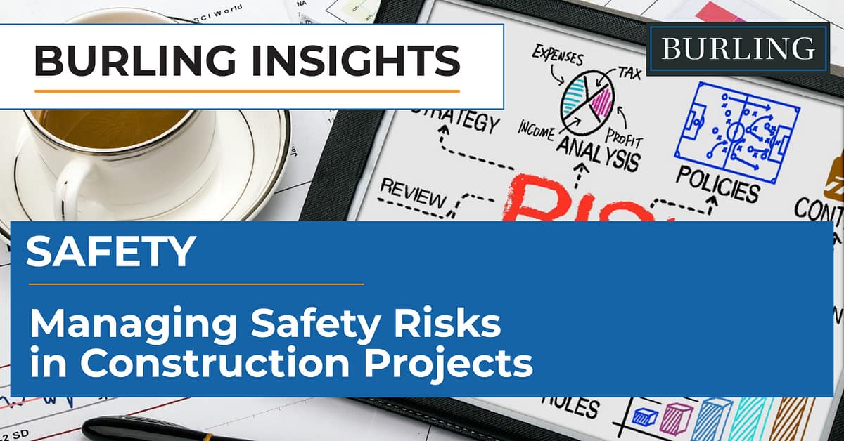 Construction workers wearing safety vests and hard hats on a job site demonstrating safety risk management practices.